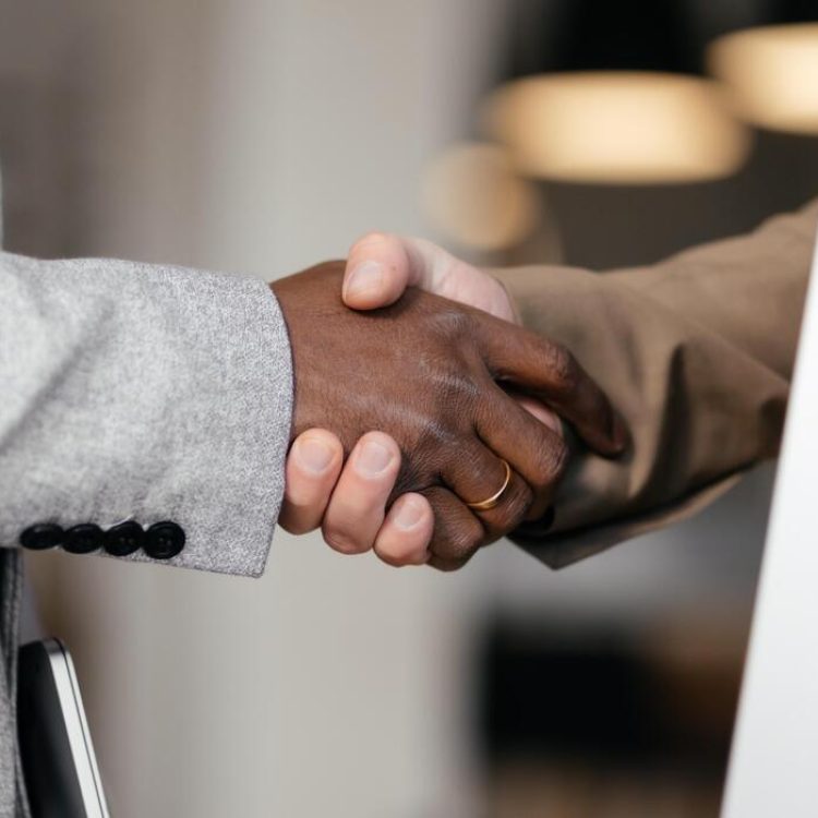 business-handshake-for-cooperation-welcome-or-thank-you-for-meeting-partnership-shaking-hands-or-contact-with-greeting-for-b2b-or-teamwork-collaboration-or-success-photo
